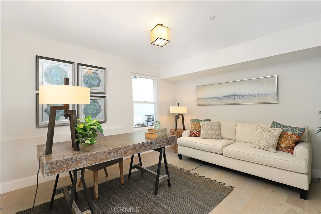 1 Turnberry Lane Phillips Ranch, CA 91766 - Photo 48 of 63 a living room with furniture and wooden floor