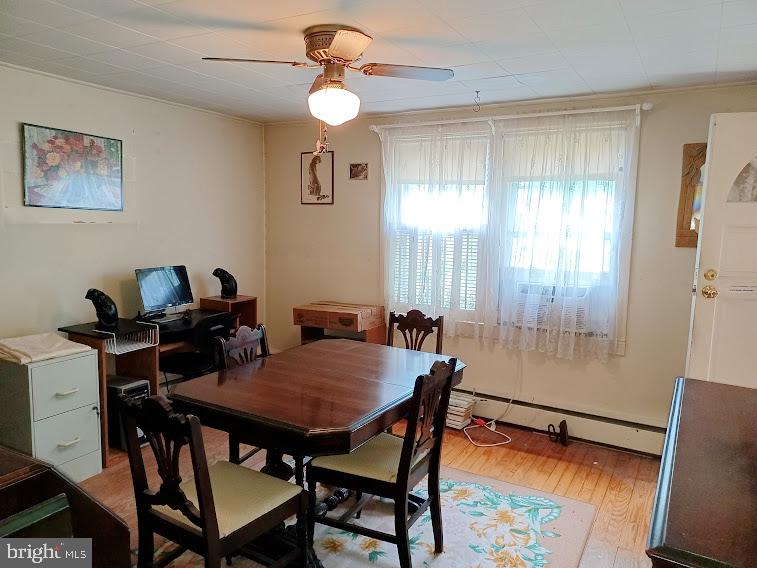 1819 Division Road Pasadena, MD 21122 - Photo 14 of 26 Formal Dining with wood floors
