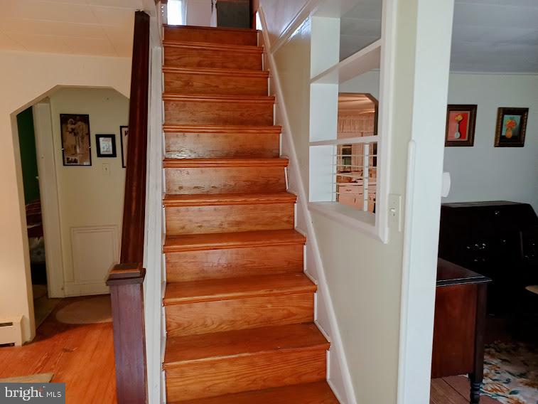 1819 Division Road Pasadena, MD 21122 - Photo 16 of 26 Wood finished stairs to upstairs
