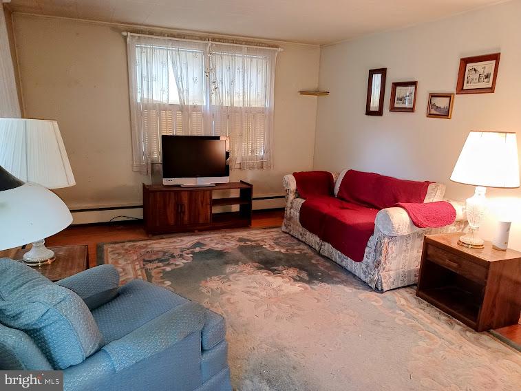 1819 Division Road Pasadena, MD 21122 - Photo 4 of 26 Wood flooring in Living Room