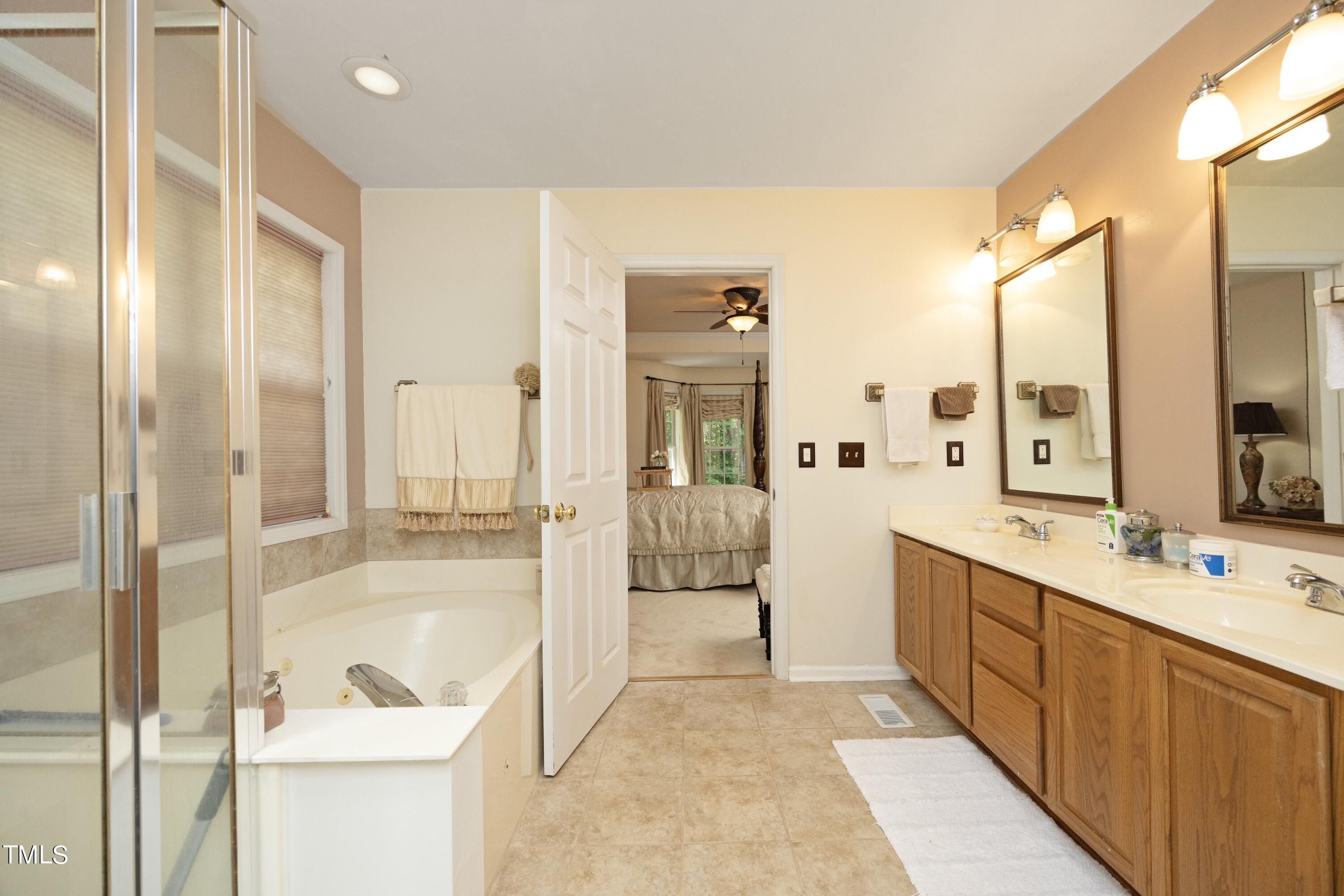 8909 Blakehurst Drive Raleigh, NC 27617 - Photo 21 of 35 21PrimaryBath