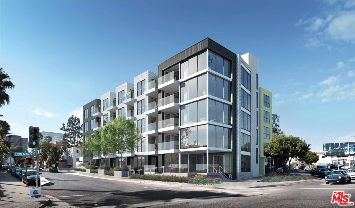 12431 Rochester Avenue, Unit PH4 Los Angeles, CA 90025 - Photo 27 of 28 a view of a tall building next to a road