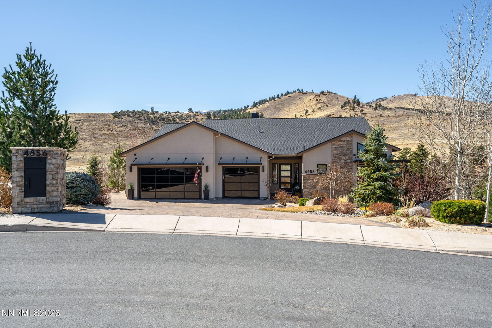 4856 Sierra Pine Court Reno, NV 89519 - Photo 2 of 71 a view of house with a outdoor space