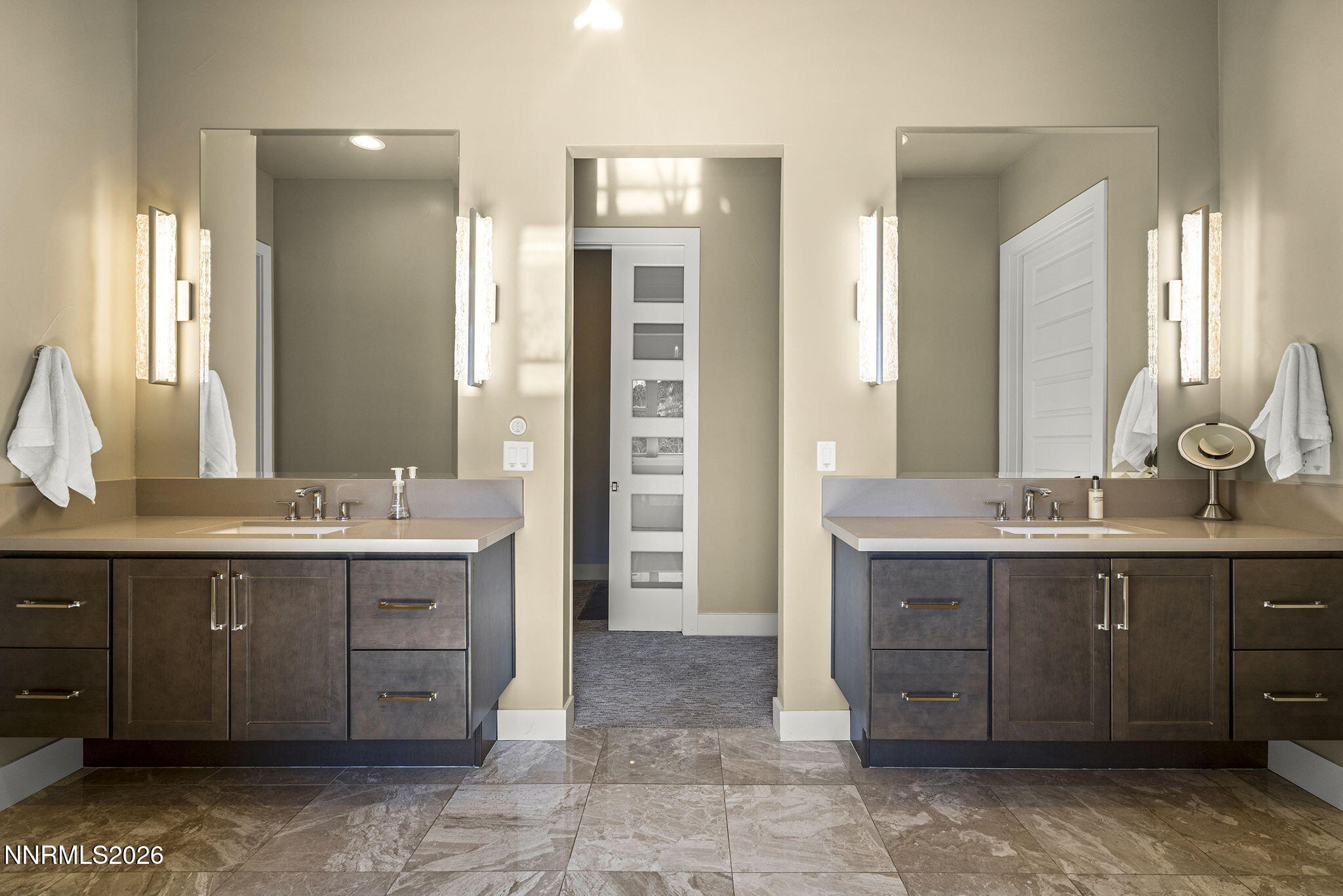 4856 Sierra Pine Court Reno, NV 89519 - Photo 30 of 71 a spacious bathroom with a granite countertop sink and a mirror