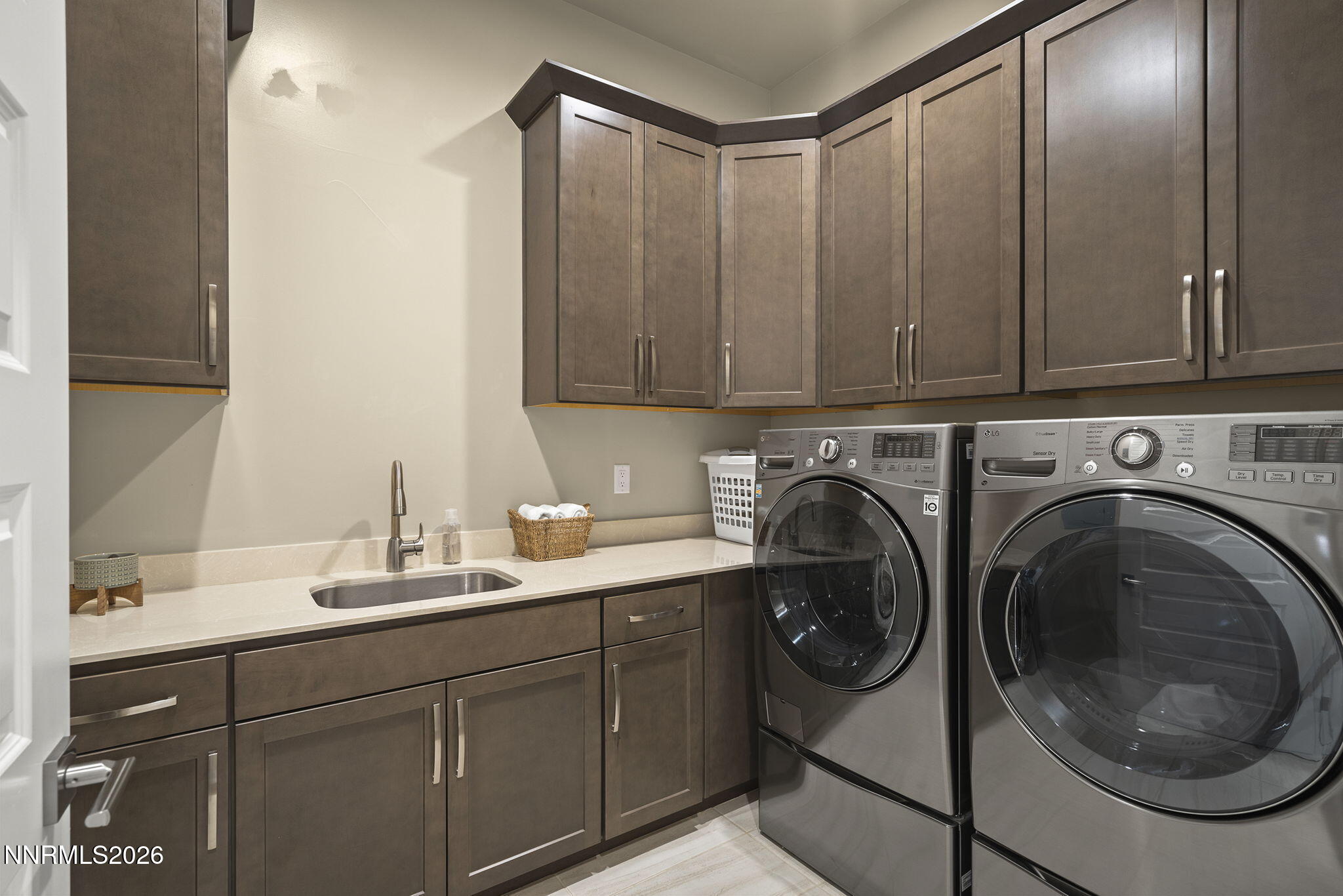 4856 Sierra Pine Court Reno, NV 89519 - Photo 32 of 71 a utility room with sink dryer and washer