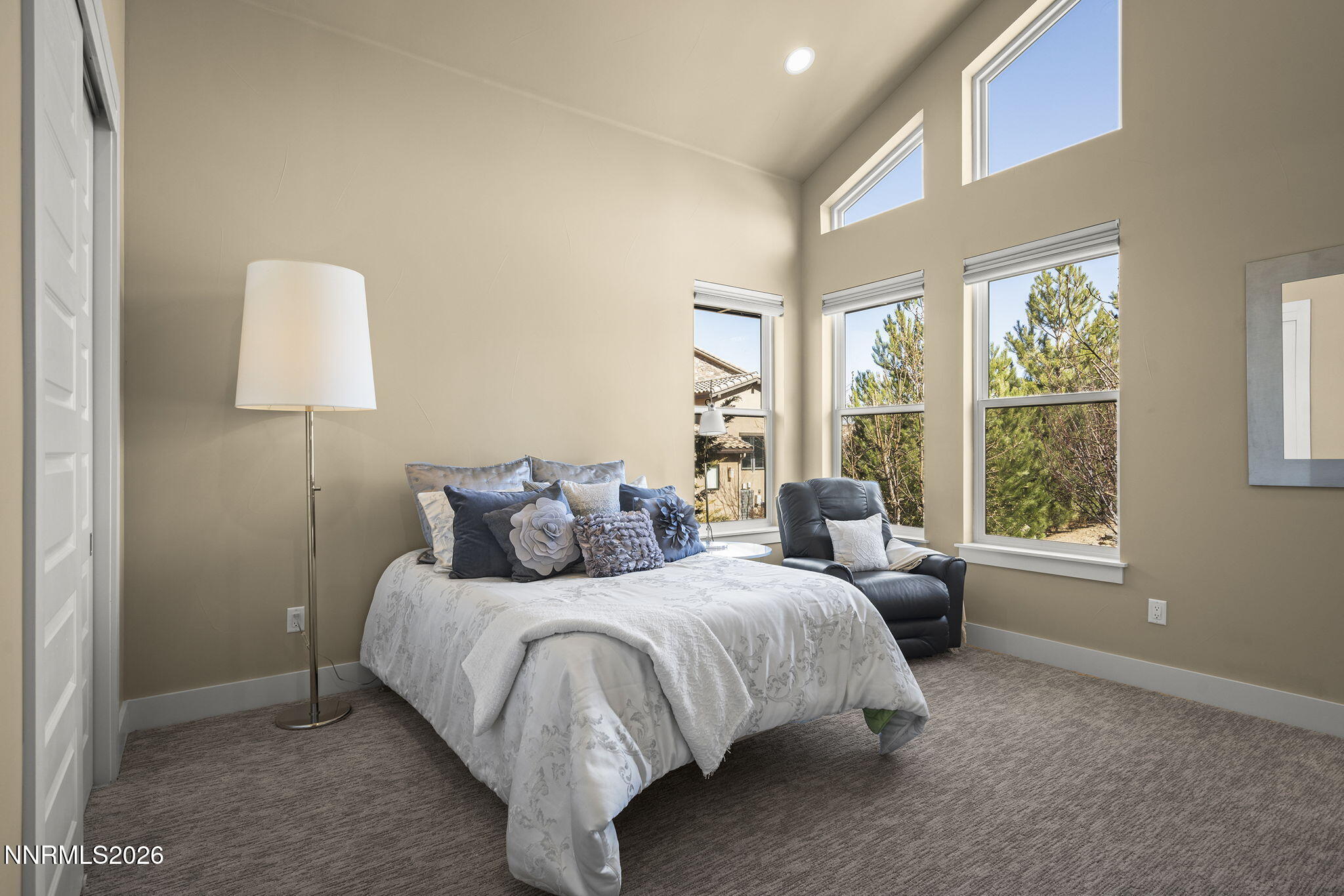 4856 Sierra Pine Court Reno, NV 89519 - Photo 34 of 71 a bedroom with a bed and a window