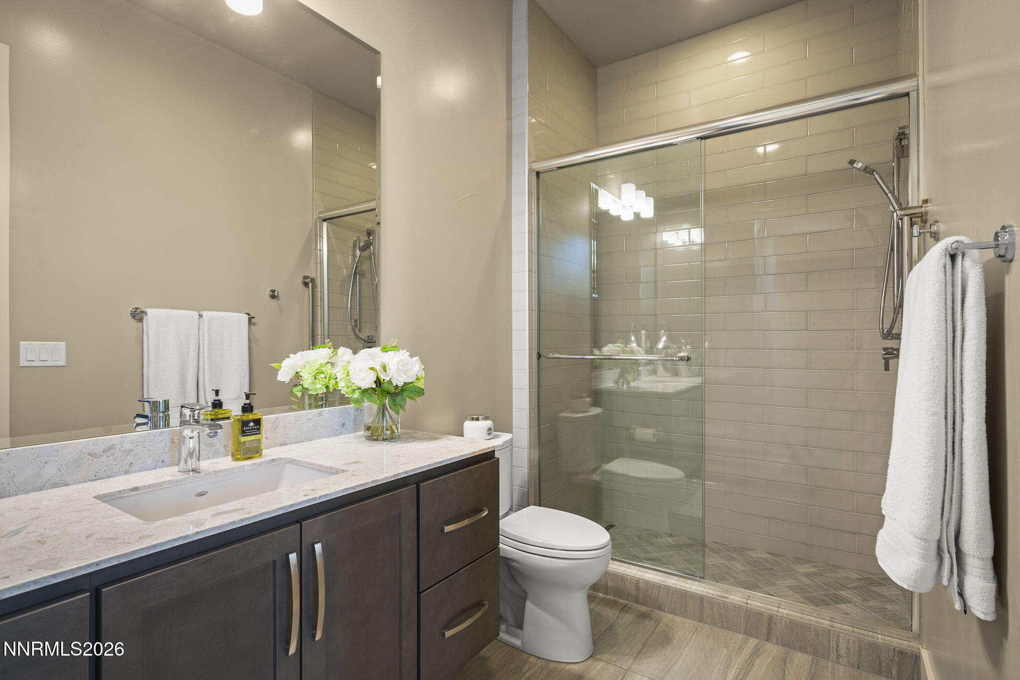 4856 Sierra Pine Court Reno, NV 89519 - Photo 35 of 71 a bathroom with a sink and a mirror