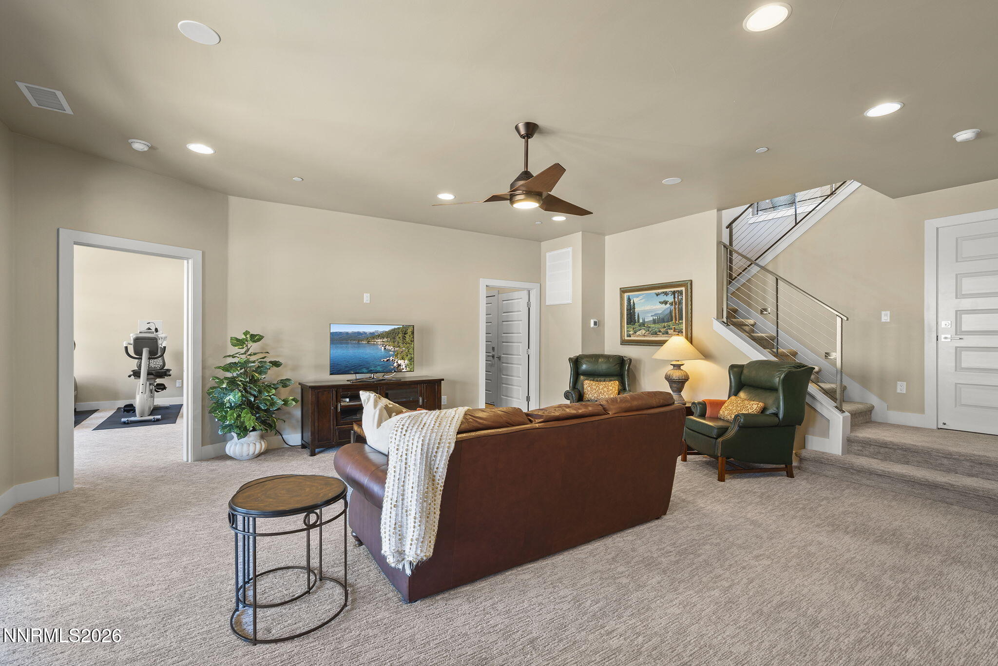 4856 Sierra Pine Court Reno, NV 89519 - Photo 36 of 71 a bed room with furniture and a chandelier