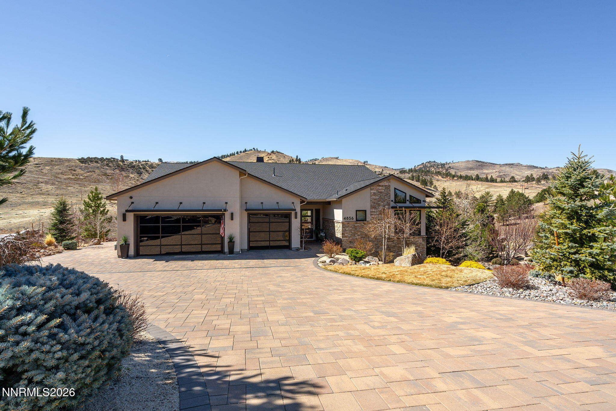 4856 Sierra Pine Court Reno, NV 89519 - Photo 4 of 71 a view of a house with a yard