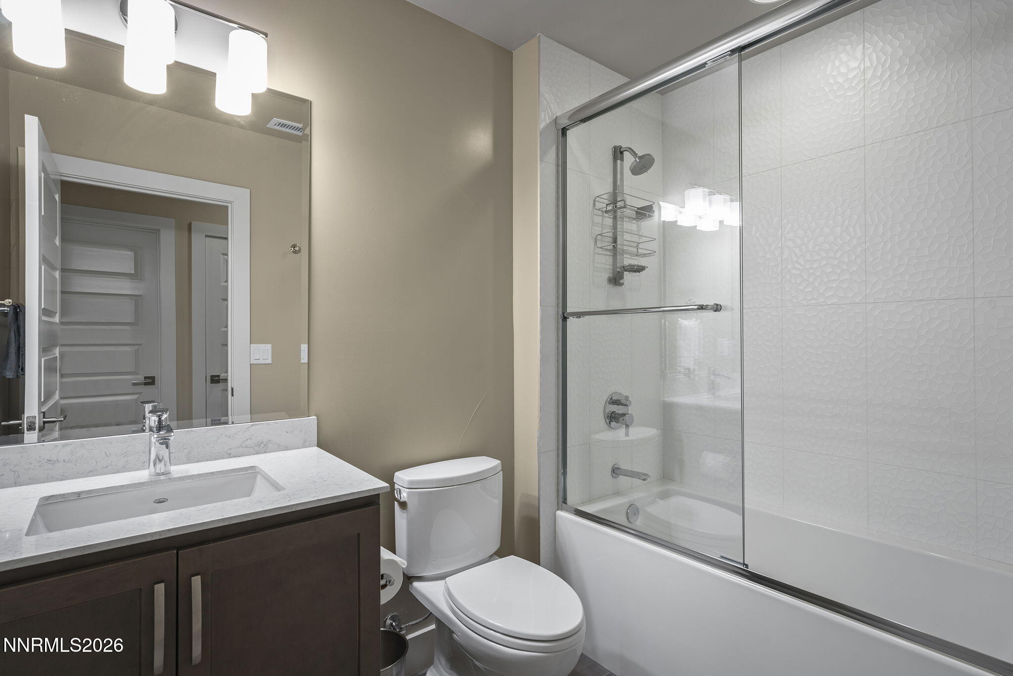 4856 Sierra Pine Court Reno, NV 89519 - Photo 44 of 71 a bathroom with a sink a toilet and shower