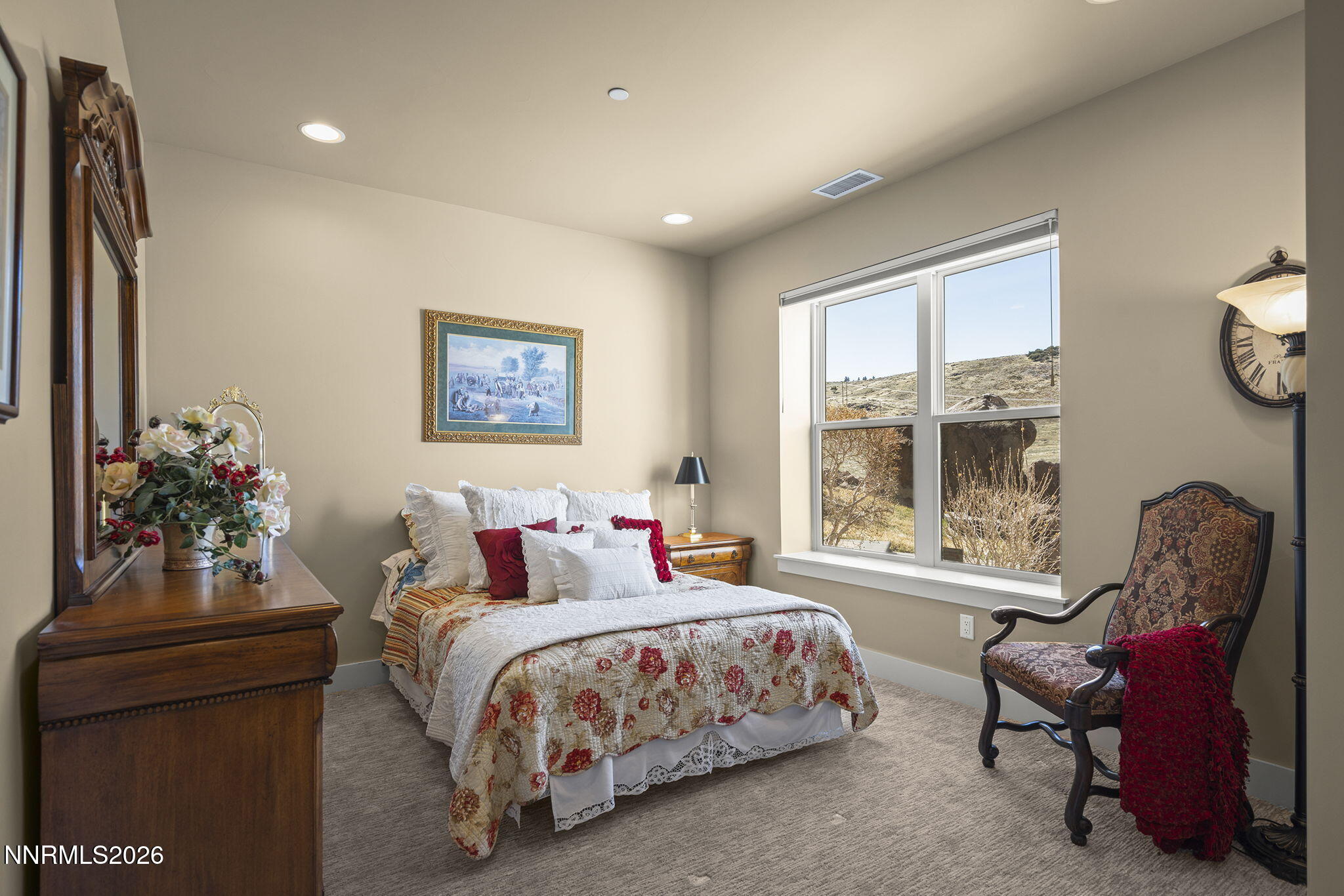 4856 Sierra Pine Court Reno, NV 89519 - Photo 45 of 71 a bedroom with a bed and a couch