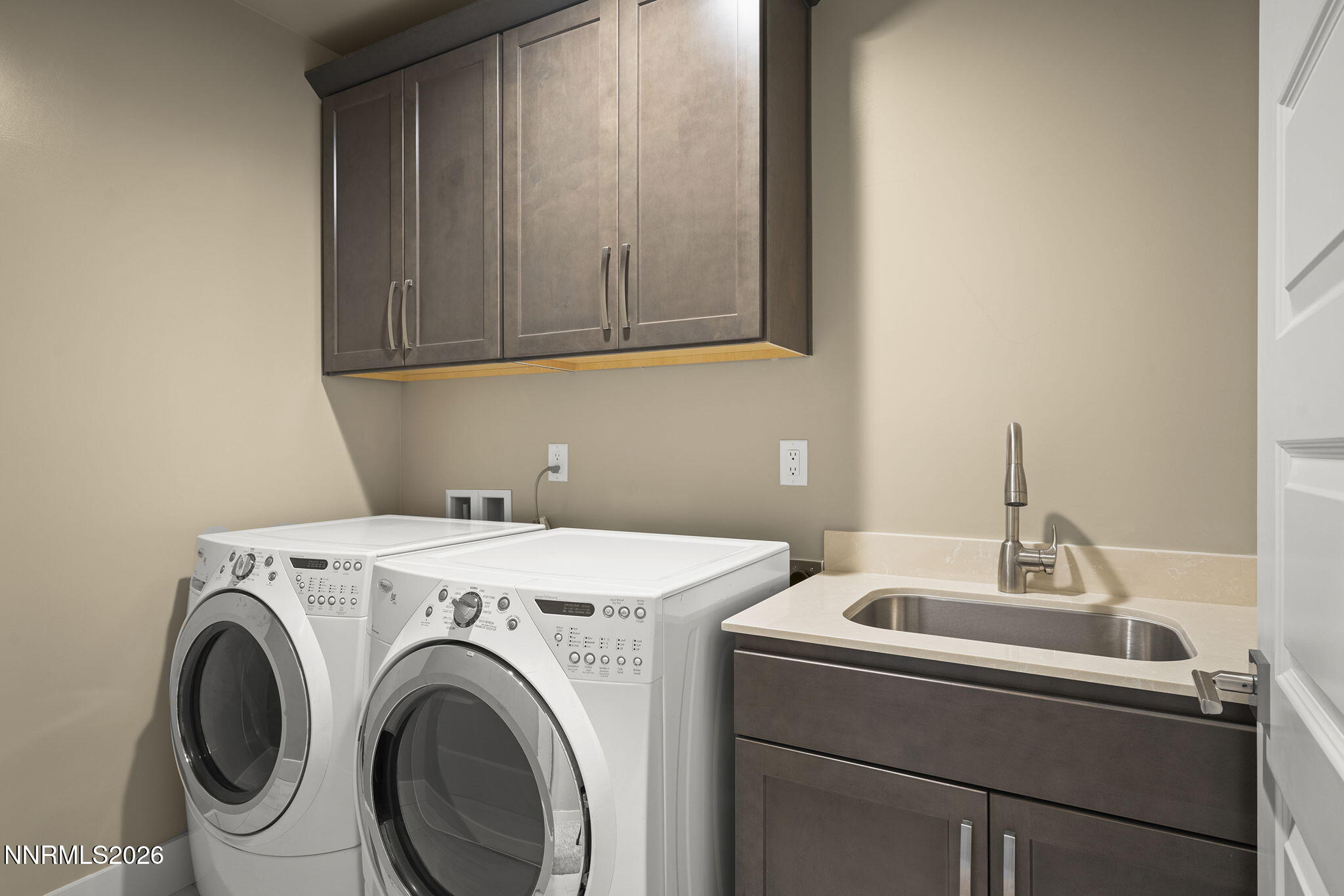 4856 Sierra Pine Court Reno, NV 89519 - Photo 46 of 71 a utility room with dryer and washer
