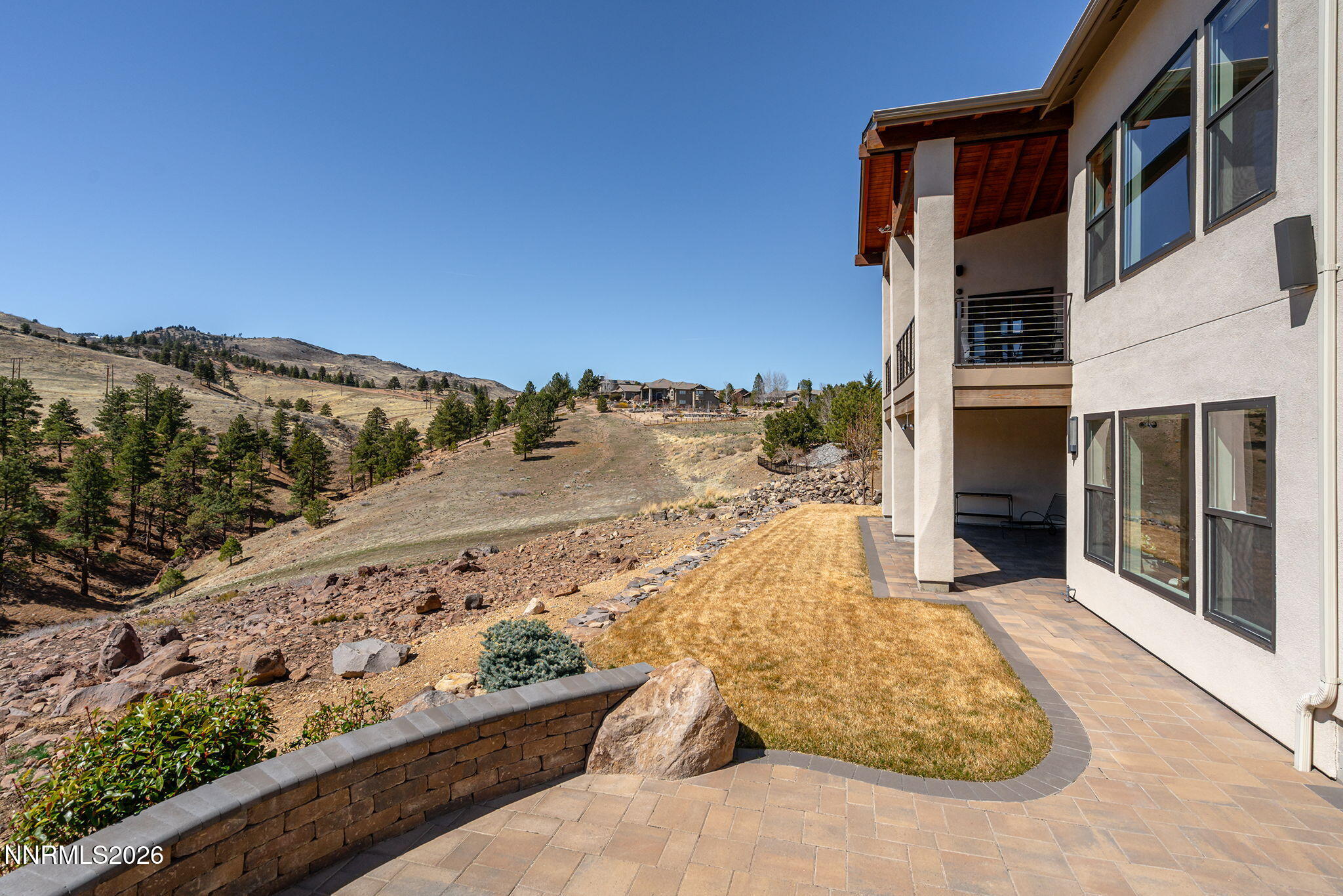 4856 Sierra Pine Court Reno, NV 89519 - Photo 55 of 71 a view of a balcony with an ocean view