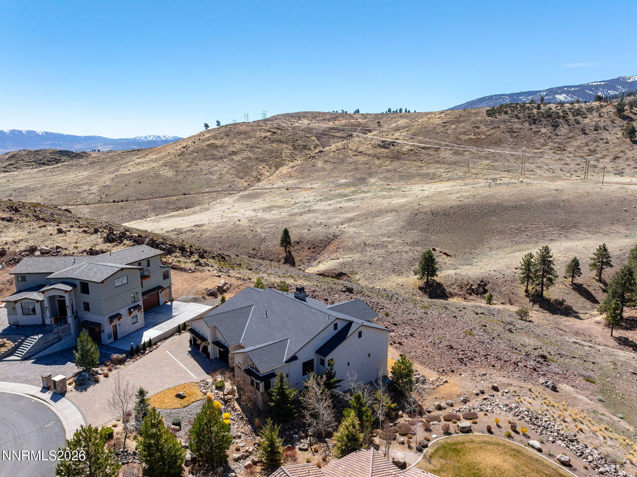 4856 Sierra Pine Court Reno, NV 89519 - Photo 57 of 71 an aerial view of houses with a yard