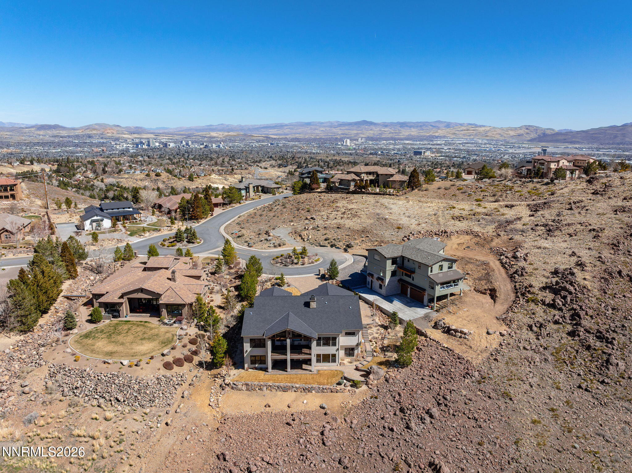 4856 Sierra Pine Court Reno, NV 89519 - Photo 60 of 71 an aerial view of residential houses with outdoor space