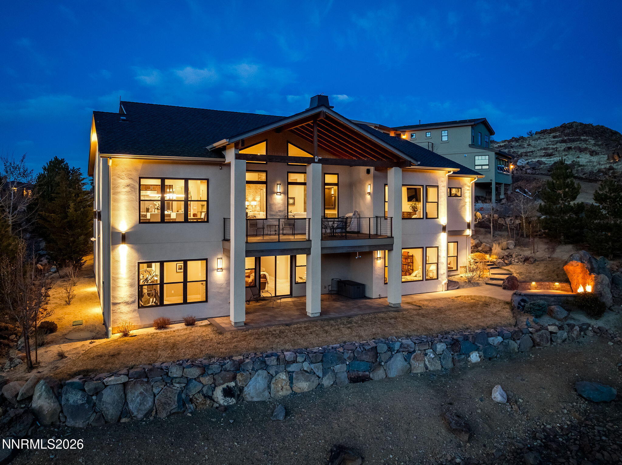 4856 Sierra Pine Court Reno, NV 89519 - Photo 67 of 71 a front view of a house with a yard