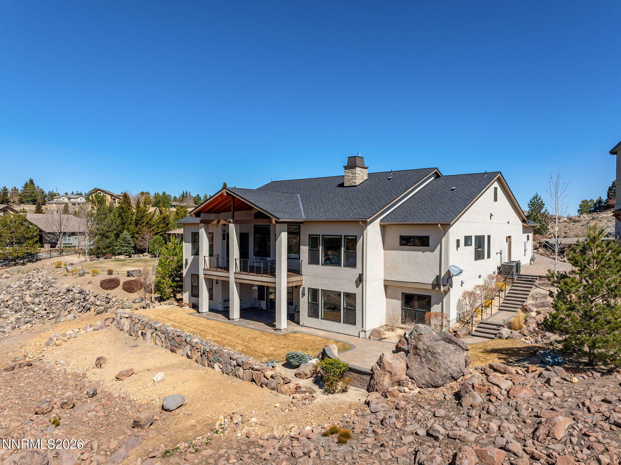 4856 Sierra Pine Court Reno, NV 89519 - Photo 70 of 71 a front view of a house with a yard