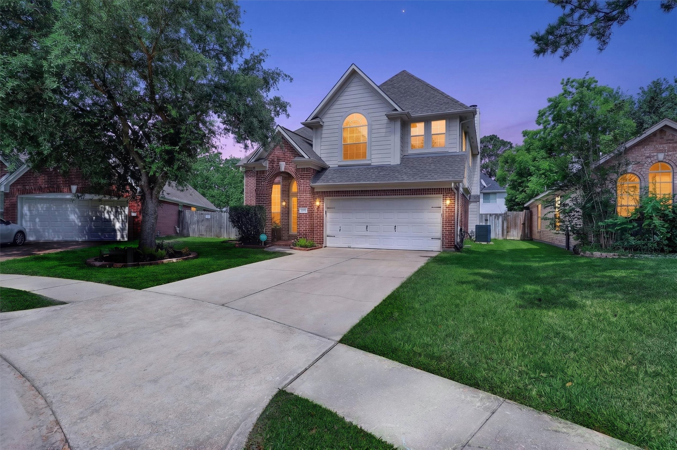 10054 Rio Bravo Road Houston, TX 77064 - Photo 4 of 41 Double wide driveway leading to the 2 car garage