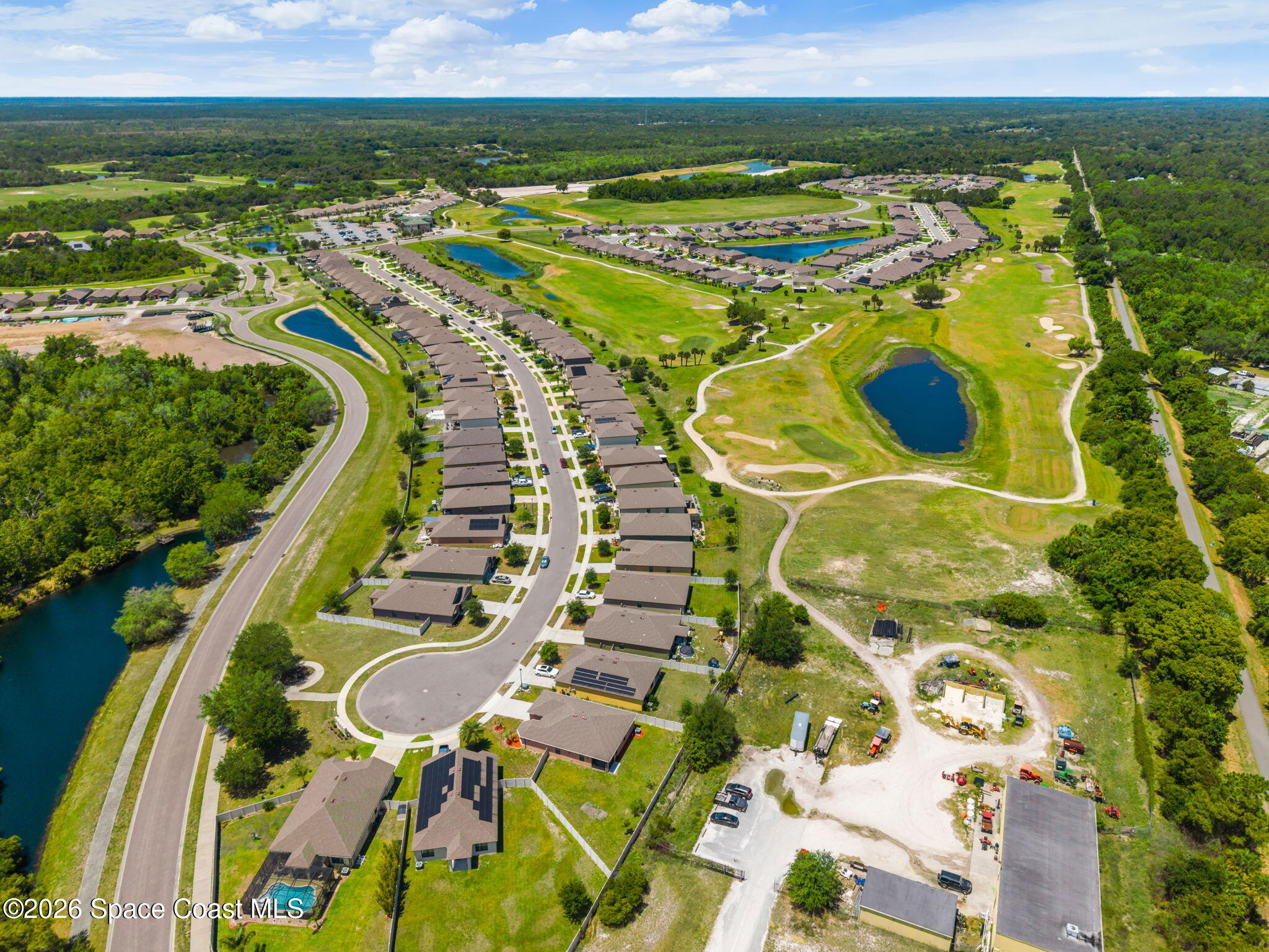 3518 Loggerhead Lane Mims, FL 32754 - Photo 22 of 35 31-Aerial-Community-with-Ponds-and-Golf-
