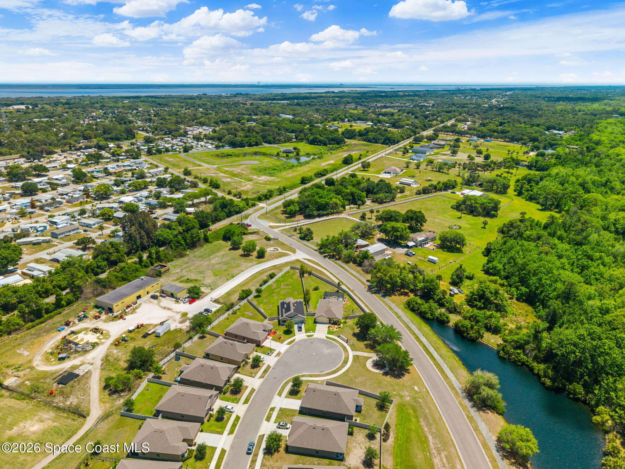 3518 Loggerhead Lane Mims, FL 32754 - Photo 23 of 35 32-Aerial-Community-Waterway-and-Surroun