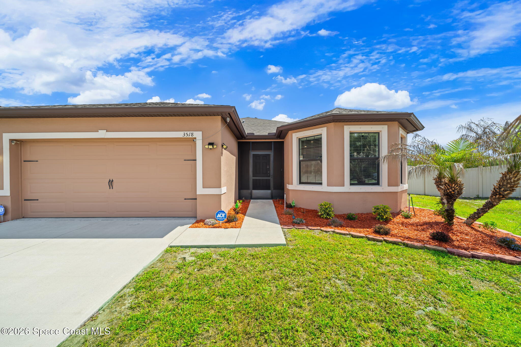 3518 Loggerhead Lane Mims, FL 32754 - Photo 29 of 35 4-Front-Exterior-Entry-and-Garage