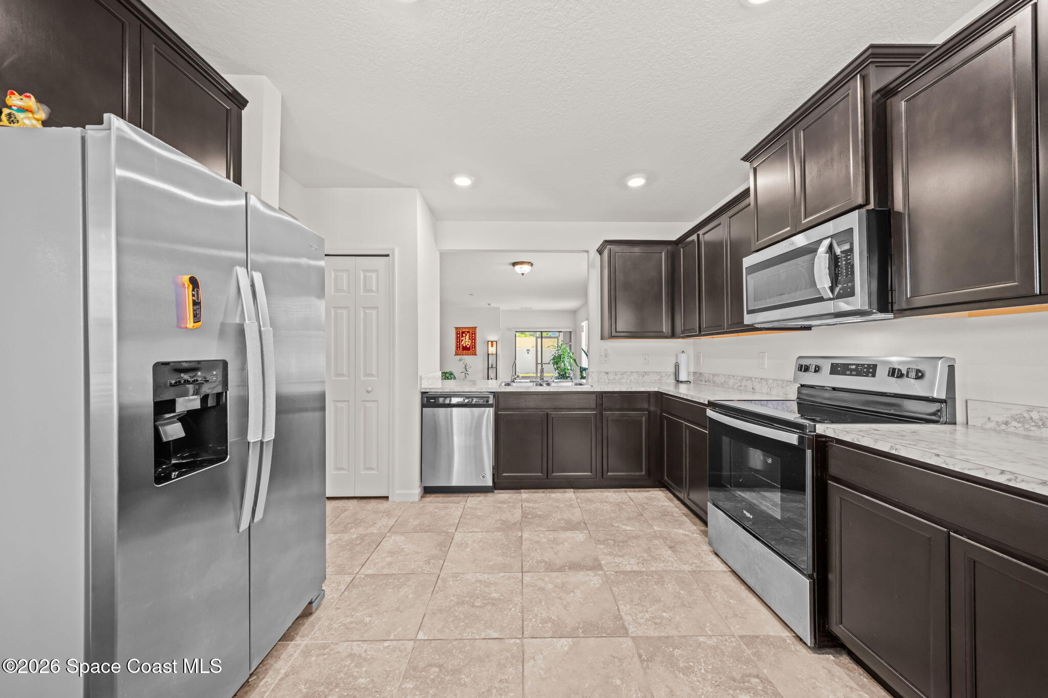 3518 Loggerhead Lane Mims, FL 32754 - Photo 33 of 35 9-Kitchen-Stainless-Appliances-and-Cabin