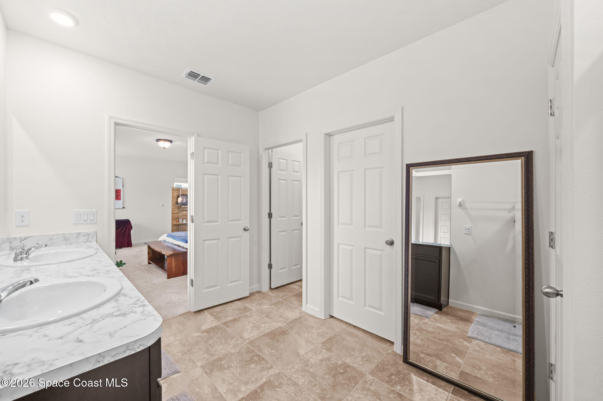 3518 Loggerhead Lane Mims, FL 32754 - Photo 9 of 35 18-Primary-Bathroom-Vanity-and-Closet-Ac
