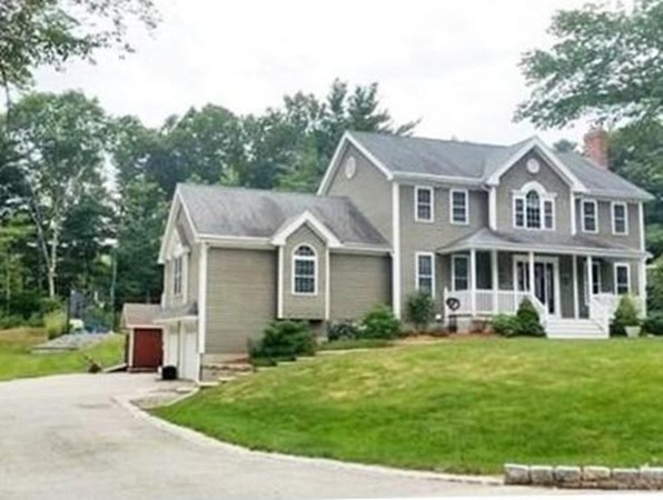 153 Old Worcester Road Charlton, MA 01507 - Photo 1 of 30 a front view of a house with a yard