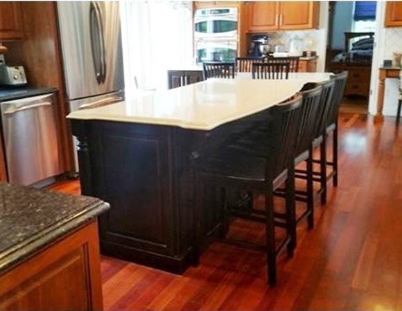 153 Old Worcester Road Charlton, MA 01507 - Photo 12 of 30 a dining room with wooden floor and furniture
