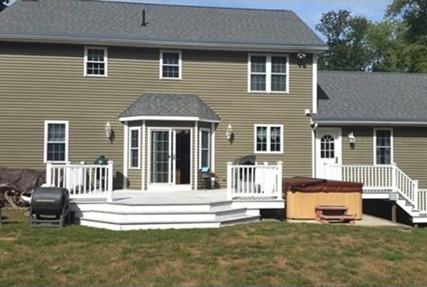 153 Old Worcester Road Charlton, MA 01507 - Photo 7 of 30 a house that has a garden in front of a house