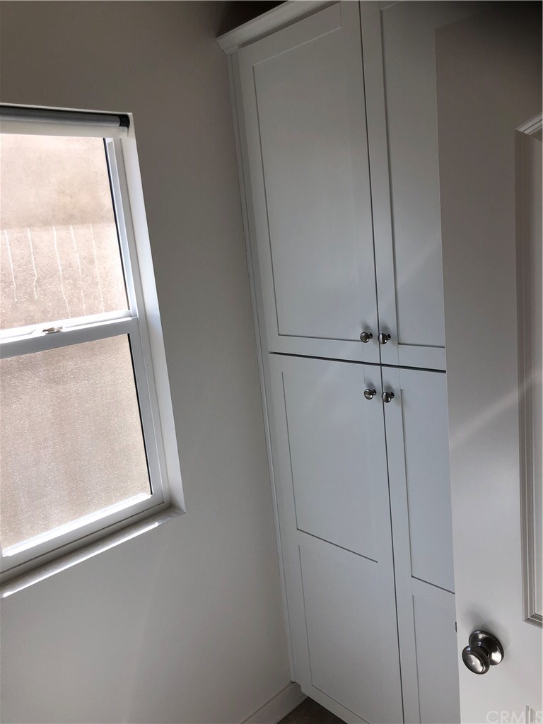 8865 Maple Avenue Montclair, CA 91763 - Photo 22 of 26 Laundry Room Bonus feature Niche Tall Cabinets.