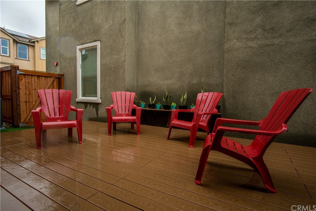 8865 Maple Avenue Montclair, CA 91763 - Photo 8 of 26 Patio Deck on a rainy day.