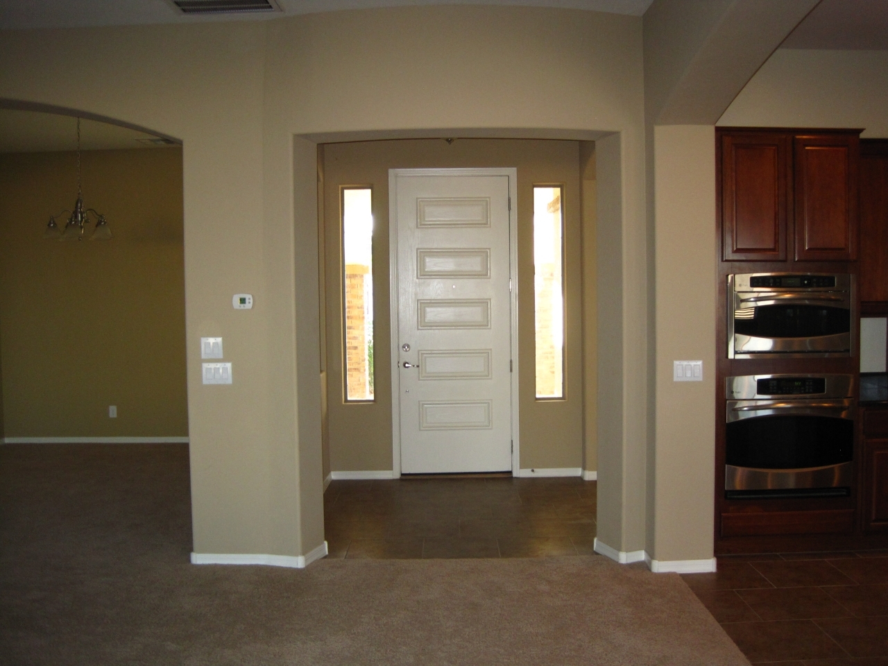 4729 South Burma Road Gilbert, AZ 85297 - Photo 35 of 39 Formal Dining, Entry & Kitchen