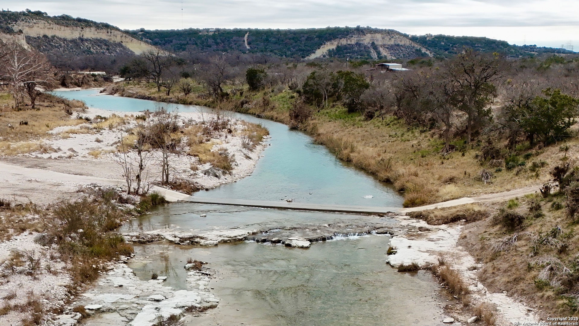 410 Craig Lane Junction, TX 76849 - Photo 11 of 53 a view of a yard with wooden fence