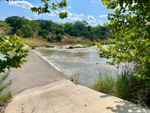 a view of a backyard of a house