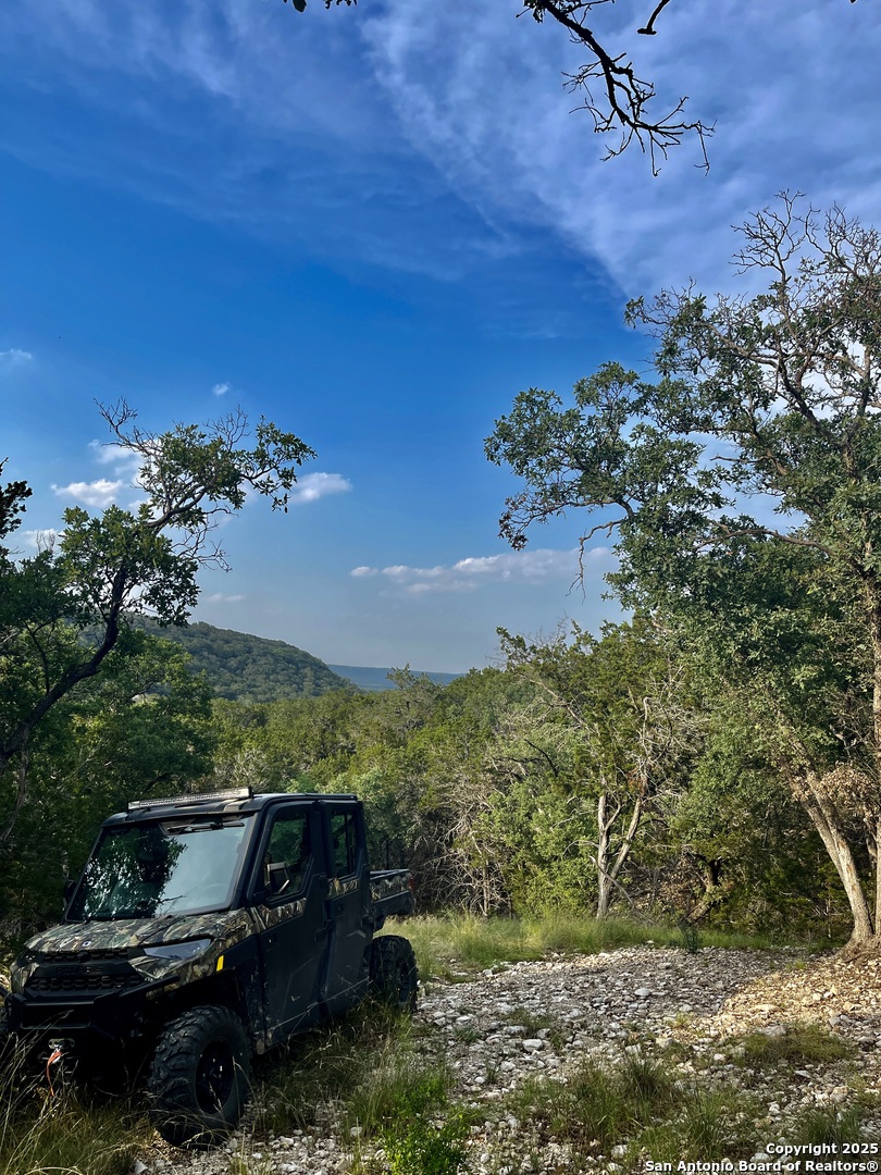 410 Craig Lane Junction, TX 76849 - Photo 20 of 53 a view of a backyard