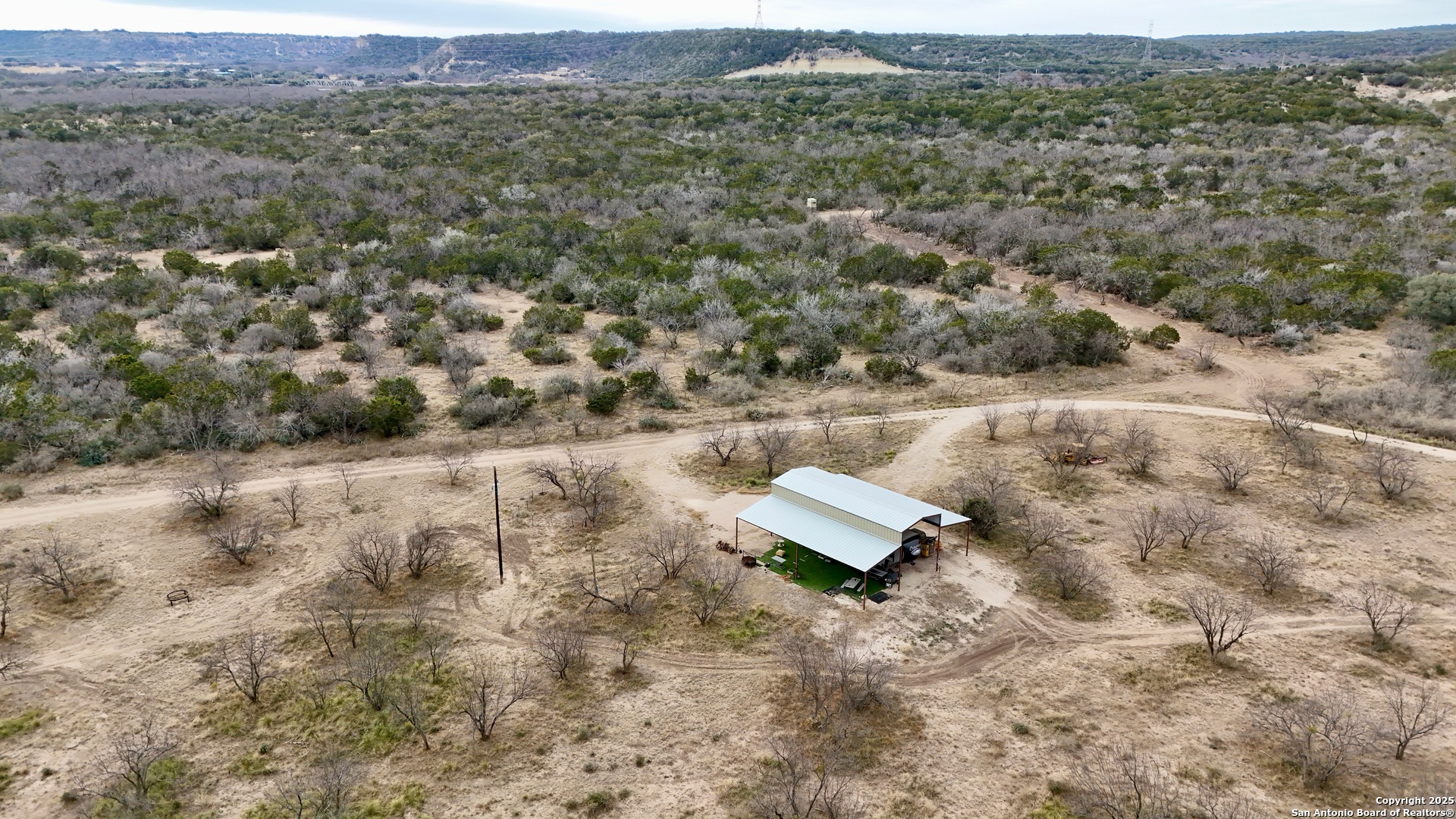 410 Craig Lane Junction, TX 76849 - Photo 32 of 53 an aerial view of houses with yard