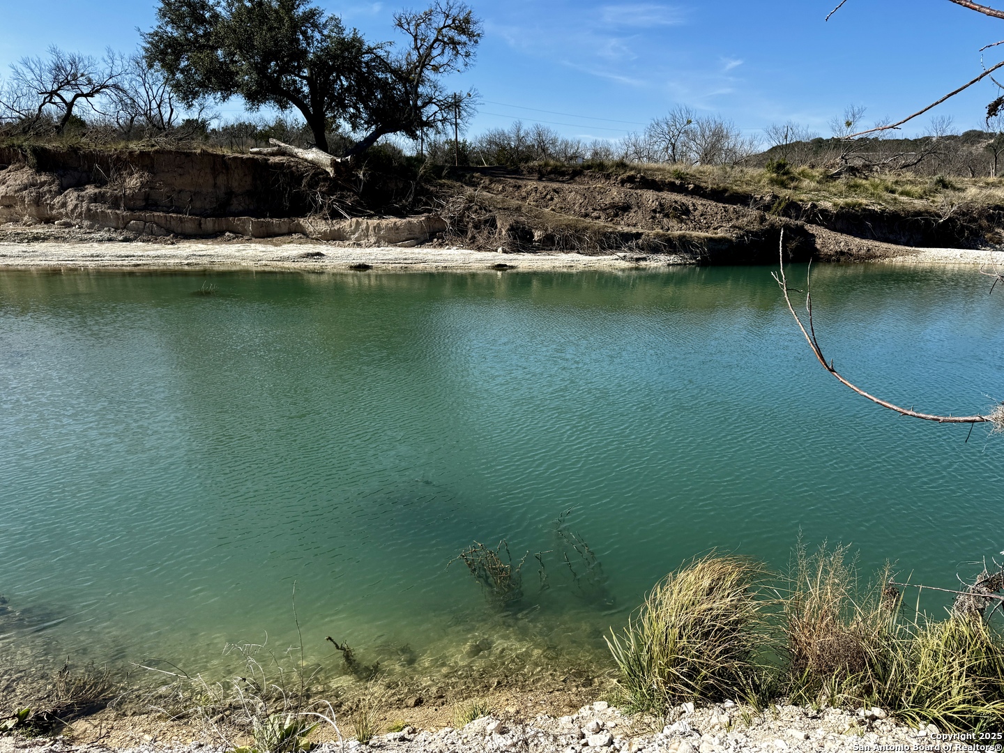 410 Craig Lane Junction, TX 76849 - Photo 42 of 53 a view of a lake with houses