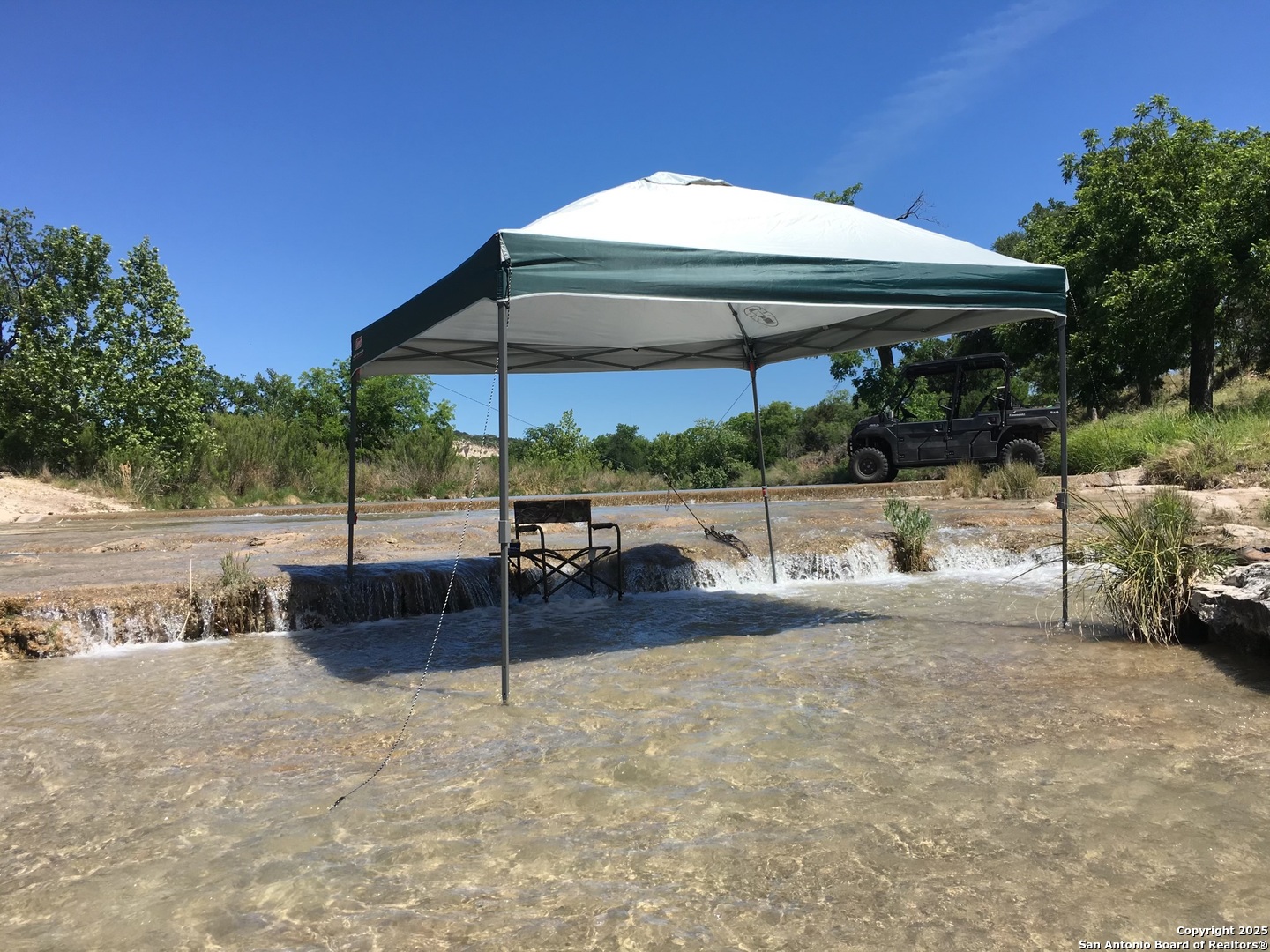 410 Craig Lane Junction, TX 76849 - Photo 9 of 53 a view of patio with a table and chairs under an umbrella