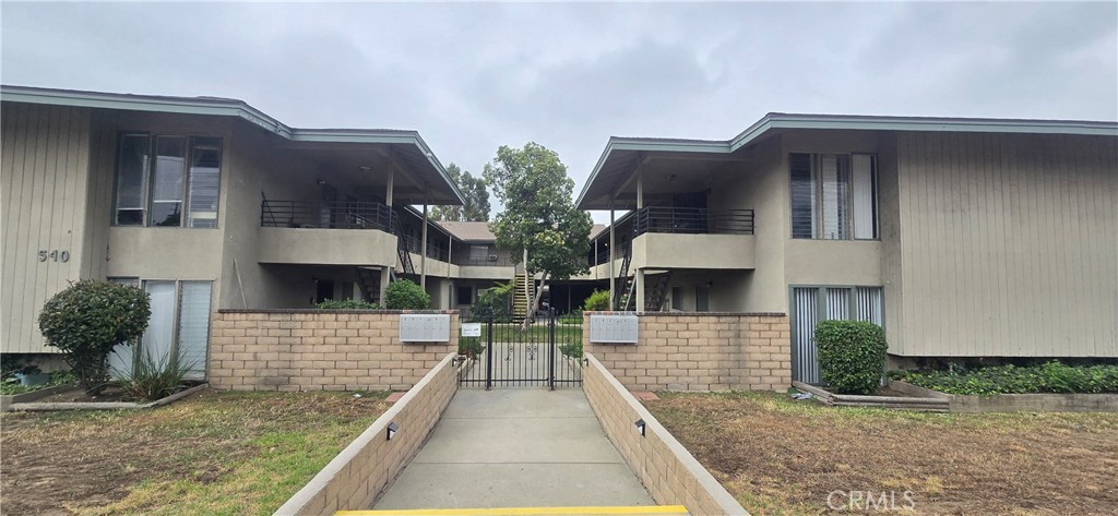 a front view of a house with garage