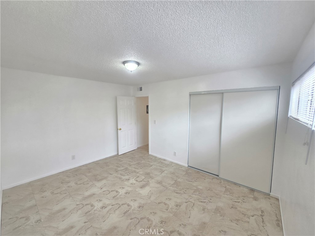 540 East 7th Street, Unit E Upland, CA 91786 - Photo 5 of 9 a view of an empty room