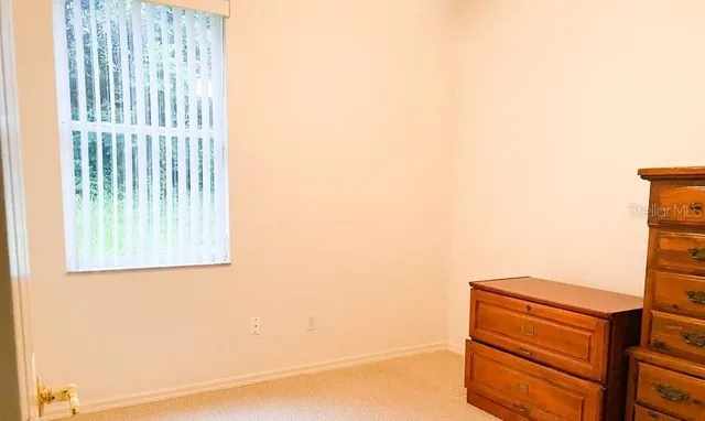 a view of a room that has a window