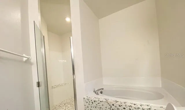 a bathroom with a bathtub