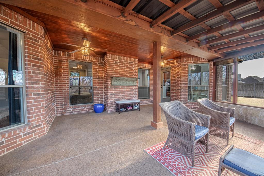 9001 Ravenswood Road Granbury, TX 76049 - Photo 31 of 38 View of patio / terrace with a ceiling fan