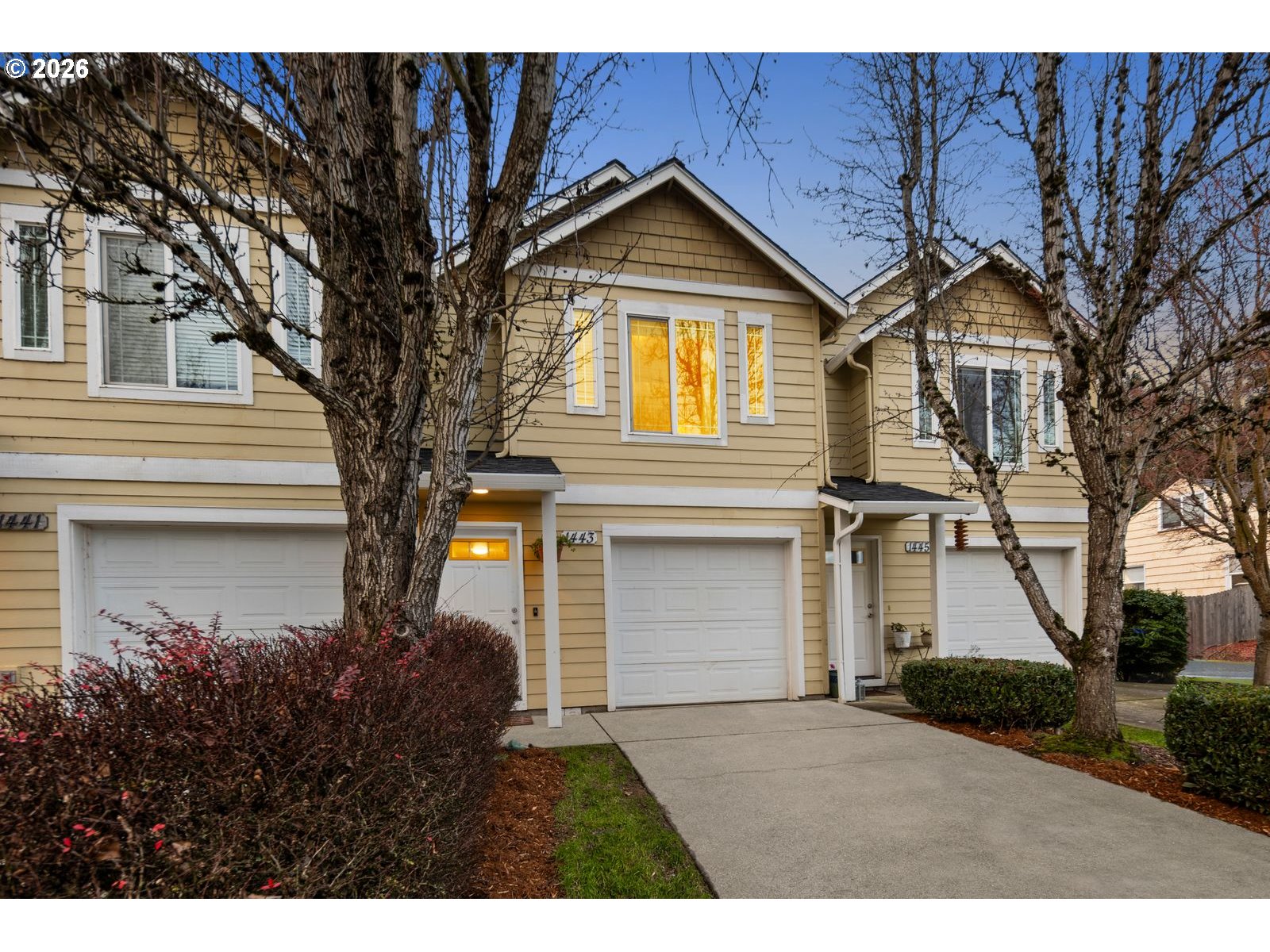 1443 Southeast 8th Avenue Camas, WA 98607 - Photo 1 of 48 a front view of a house with a yard and garage