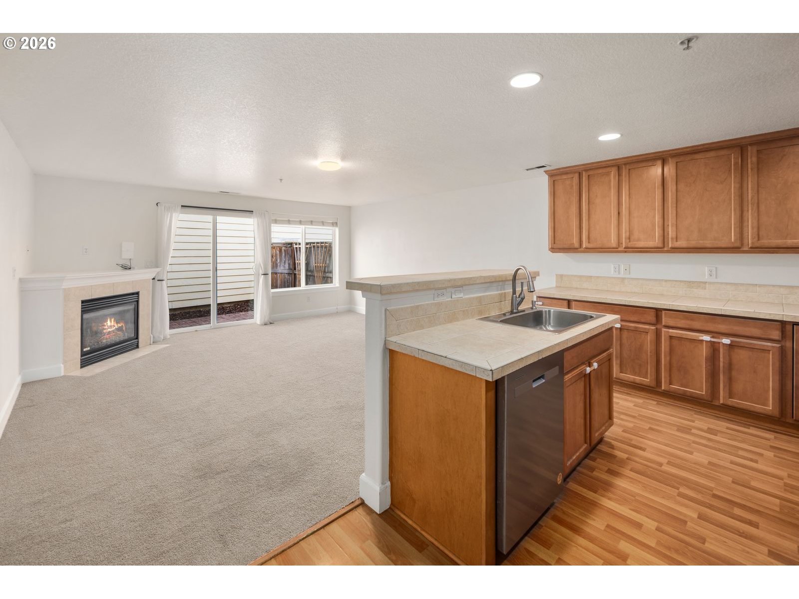 1443 Southeast 8th Avenue Camas, WA 98607 - Photo 8 of 48 a kitchen with a stove sink and cabinets