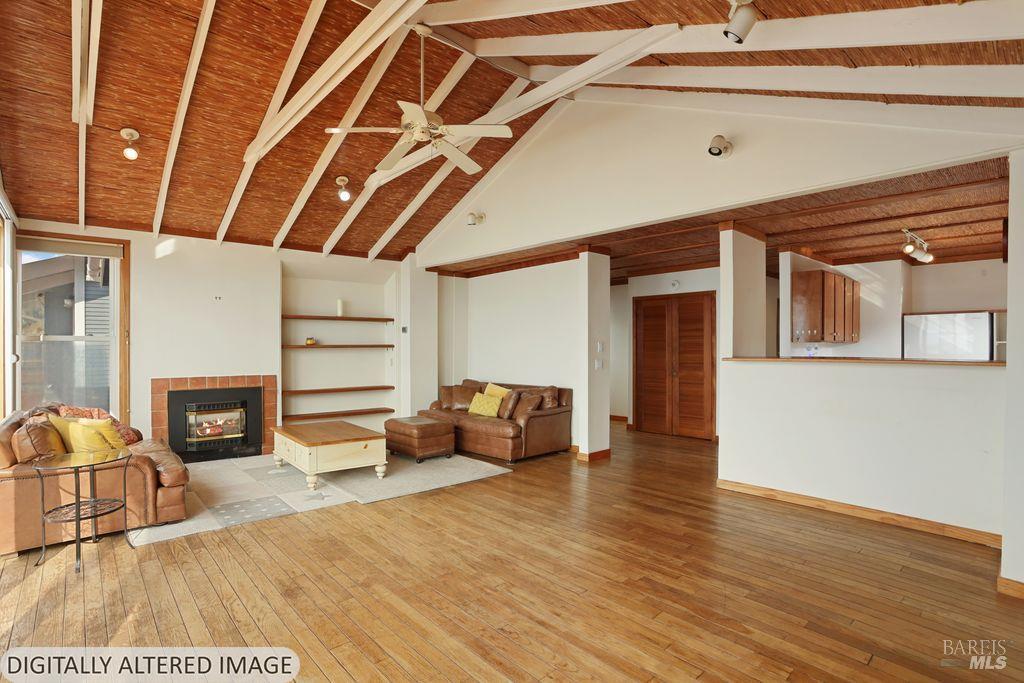34 Sandy Beach Road Vallejo, CA 94590 - Photo 22 of 63 a living room with furniture and a wooden floor