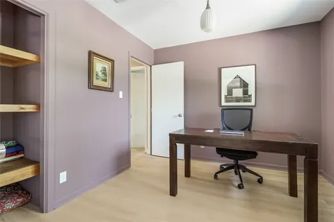 a view of a backyard with sitting area