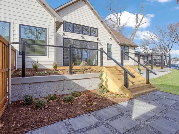 a view of a back yard of the house