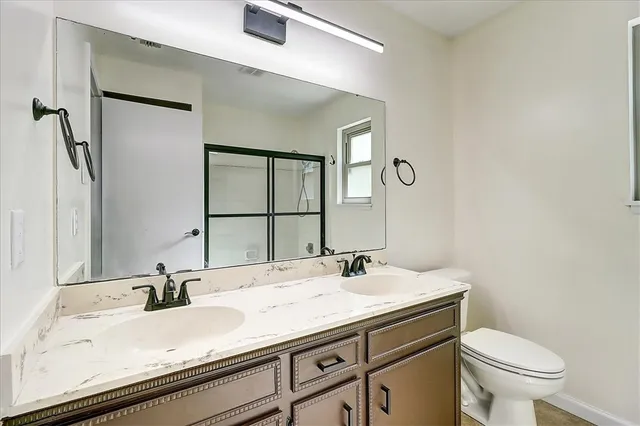a bathroom with a sink and a toilet